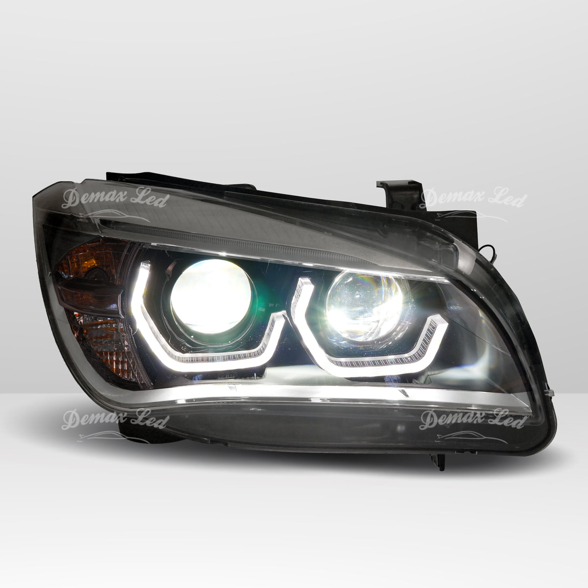 Close-up of BMW X1 E84 Full LED headlights with high beam on
